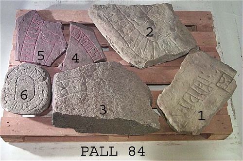 Runes written on fragment av runsten, rödaktig granit. Date: V